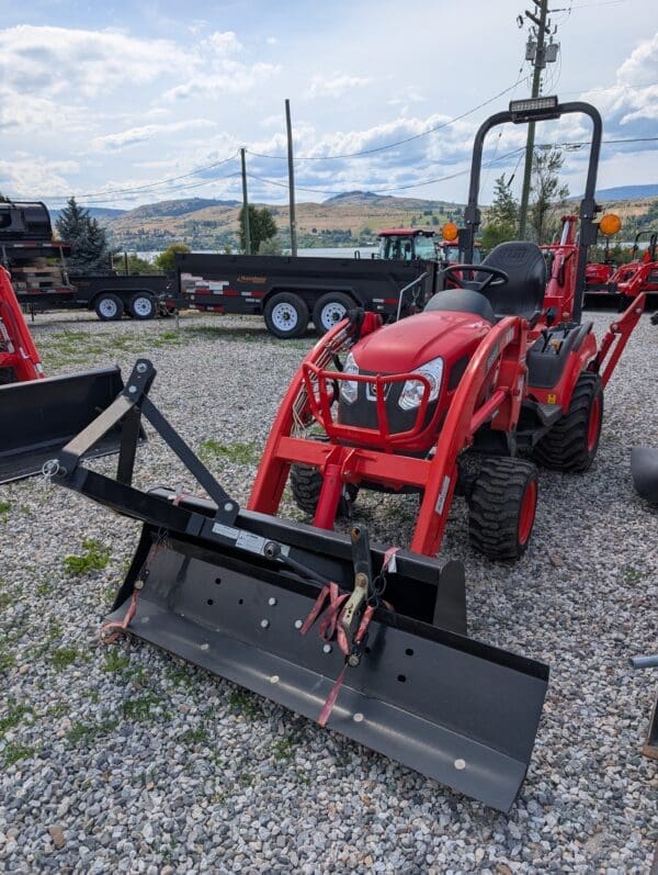 KIOTI CS2210 Tractor, Loader, Backhoe, and Rear Blade